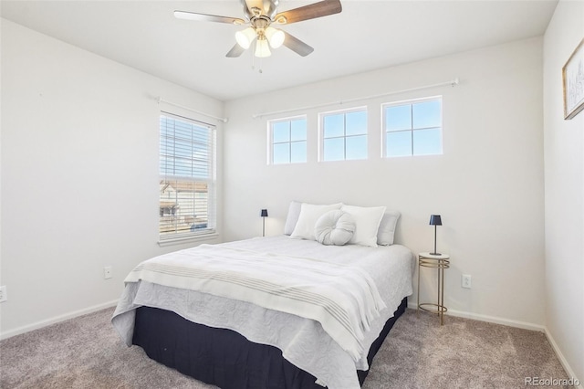 4844 Mt Evans St, Brighton, CO 80601 - carpeted bedroom with baseboards and ceiling fan
