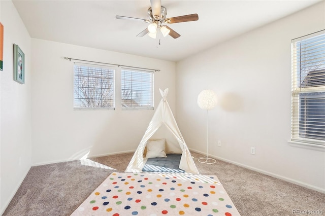 4844 Mt Evans St, Brighton, CO 80601 - playroom with carpet floors and ceiling fan