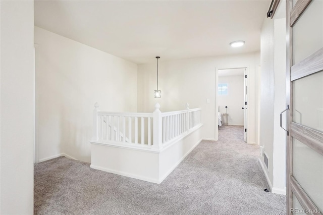 4844 Mt Evans St, Brighton, CO 80601 - hallway with an upstairs landing and carpet floors