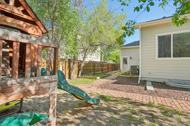 4844 Mt Evans St, Brighton, CO 80601 - fenced backyard with a playground
