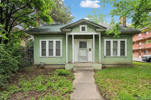 1900 S University Blvd, Denver, CO 80210 - bungalow-style house featuring a chimney and stucco siding