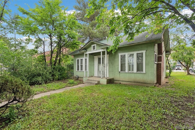 1900 S University Blvd, Denver, CO 80210 - bungalow-style home featuring stucco siding and roof with shingles