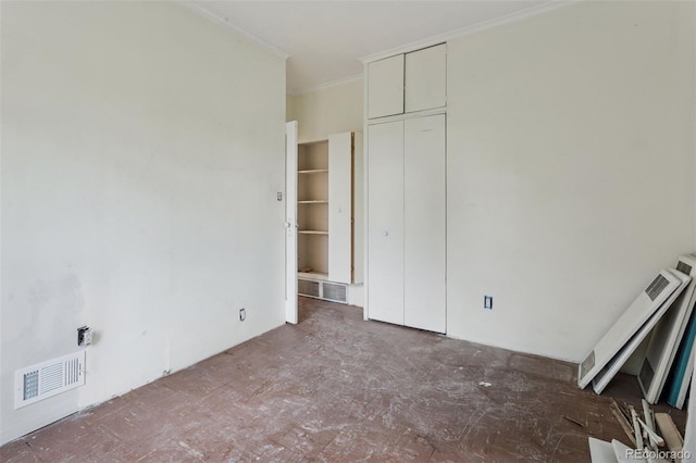 1900 S University Blvd, Denver, CO 80210 - unfurnished bedroom with crown molding, a closet, and radiator heating unit