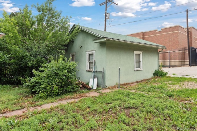 1900 S University Blvd, Denver, CO 80210 - view of home's exterior with stucco siding