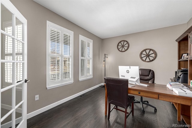 office with dark wood-style floors and baseboards