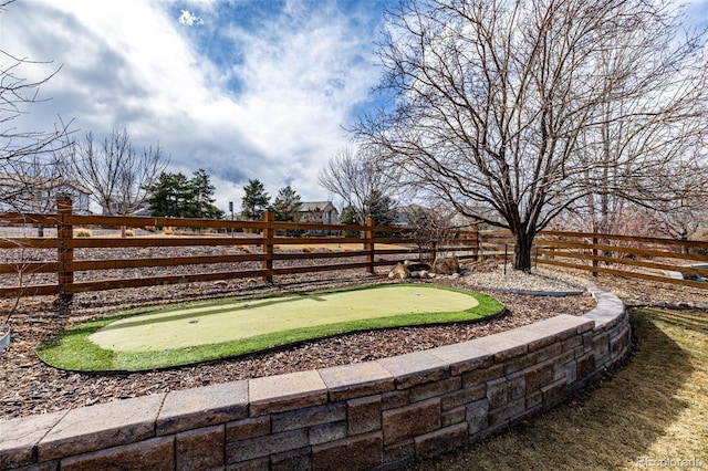 view of yard featuring fence