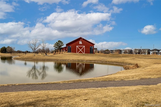 water view with a barn