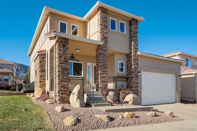 view of front of property featuring a porch and a garage