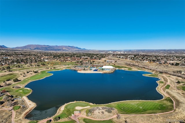 aerial view featuring a water and mountain view