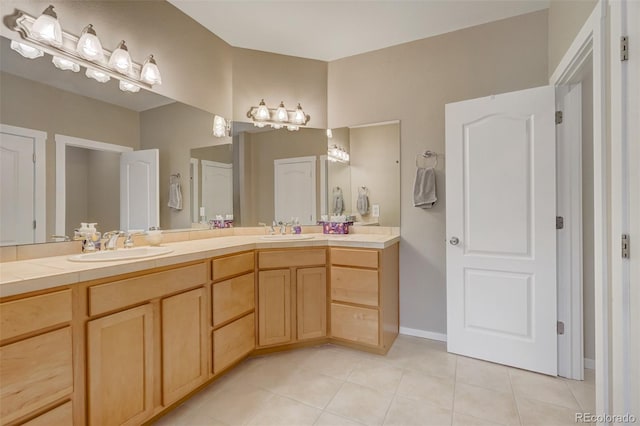 bathroom with vanity and tile patterned floors