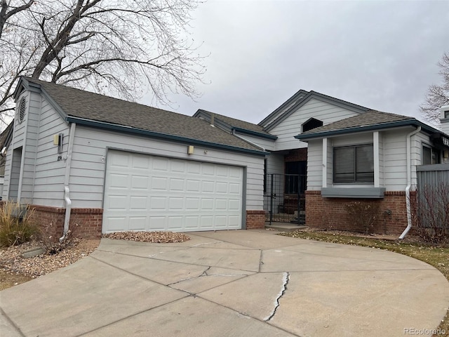 single story home with a garage