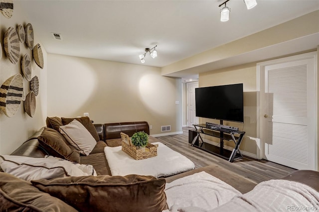 living room with hardwood / wood-style flooring