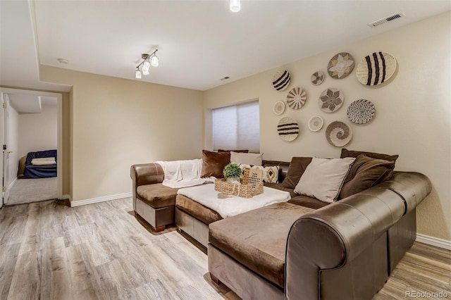 living room with light wood-type flooring