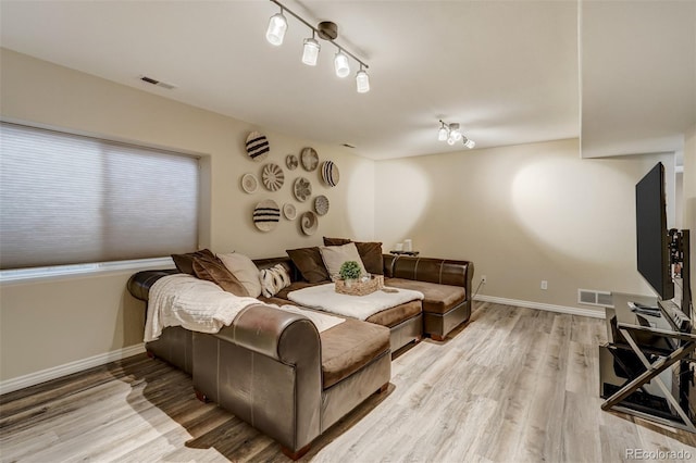 living room with light wood-type flooring