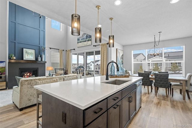 624 Simmental Loop, Castle Rock, CO 80104 - kitchen featuring healthy amount of natural light, light wood finished floors, light countertops, and recessed lighting
