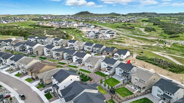 624 Simmental Loop, Castle Rock, CO 80104 - aerial view of property and surrounding area with nearby suburban area and mountains
