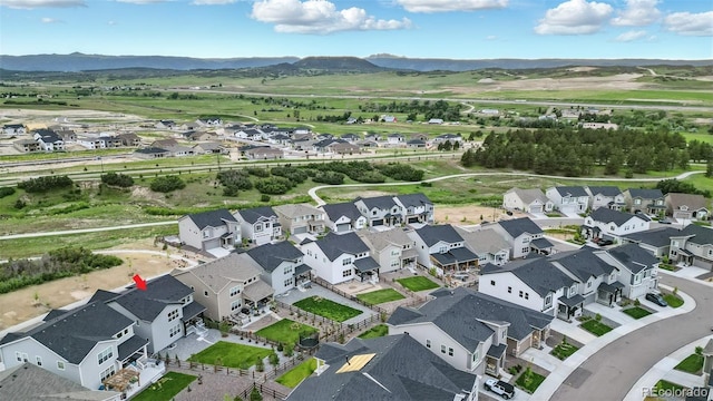 624 Simmental Loop, Castle Rock, CO 80104 - aerial view of property and surrounding area with nearby suburban area and a mountain backdrop