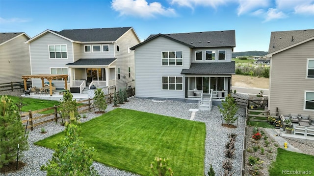 624 Simmental Loop, Castle Rock, CO 80104 - rear view of house with a pergola, a fenced backyard, a patio area, a shingled roof, and outdoor lounge area