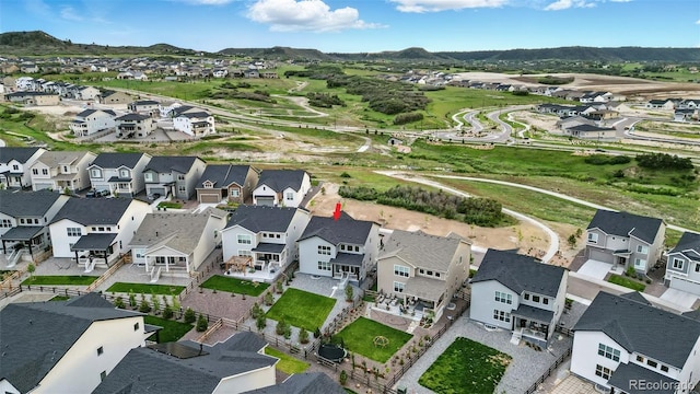 624 Simmental Loop, Castle Rock, CO 80104 - aerial view of property's location with nearby suburban area and a mountainous background
