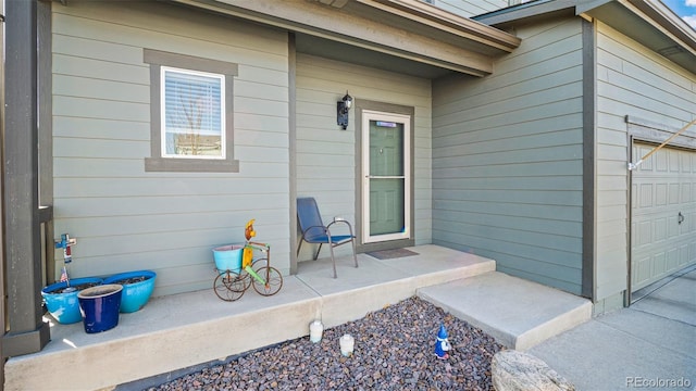 entrance to property featuring a garage