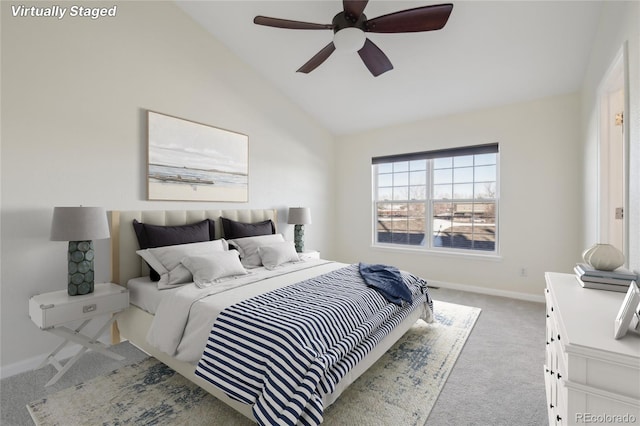 bedroom with lofted ceiling, carpet flooring, ceiling fan, and baseboards