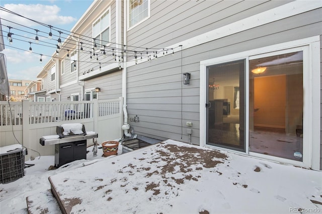 view of patio / terrace with fence and central AC unit