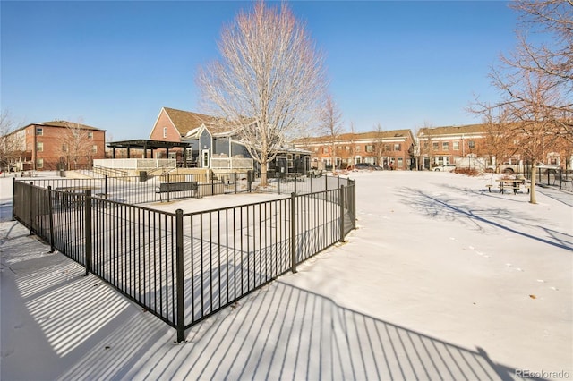 wooden deck featuring a residential view and fence