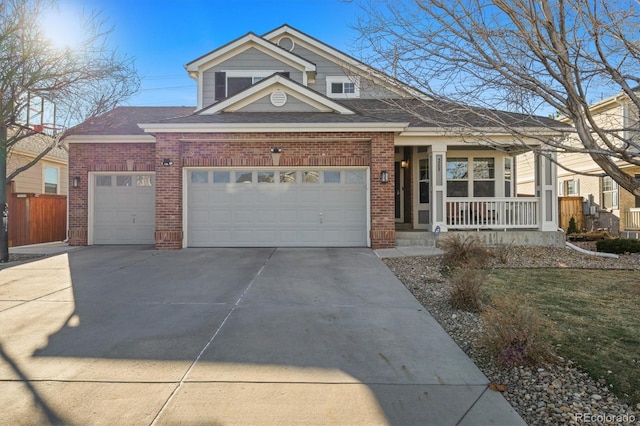 view of front of property featuring driveway, a garage, a porch, and brick siding