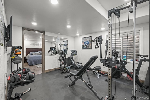 gym featuring recessed lighting