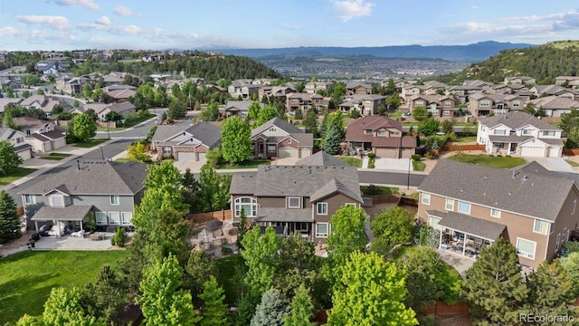 7408 Sodalite Way, Castle Rock, CO 80108 - aerial view of residential area with a mountain backdrop