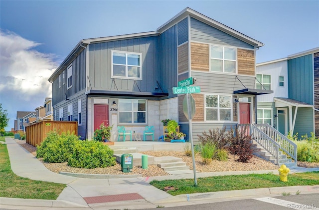 view of front of property featuring covered porch and board and batten siding