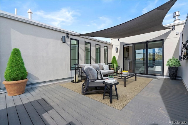 wooden deck with outdoor lounge area