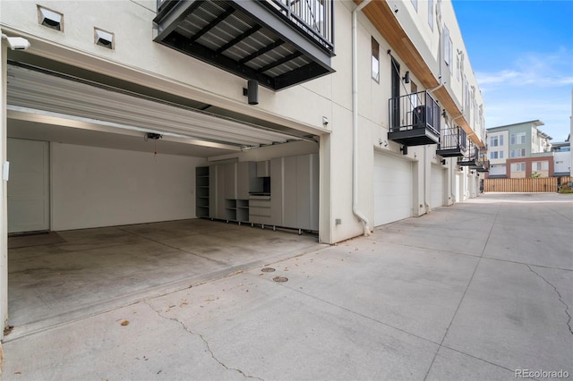 exterior space featuring concrete driveway