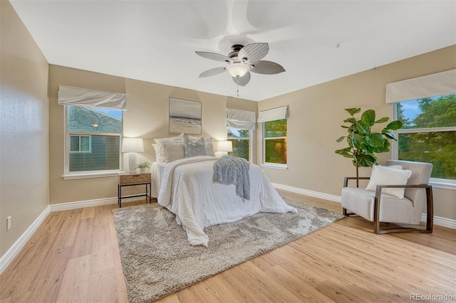 123 Wheat Ridge St, Palmer Lake, CO 80133 - bedroom featuring wood finished floors and a ceiling fan