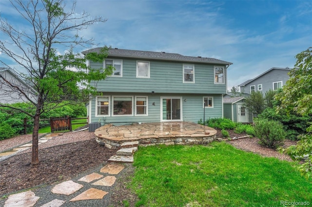 123 Wheat Ridge St, Palmer Lake, CO 80133 - back of house with a patio area and a shed