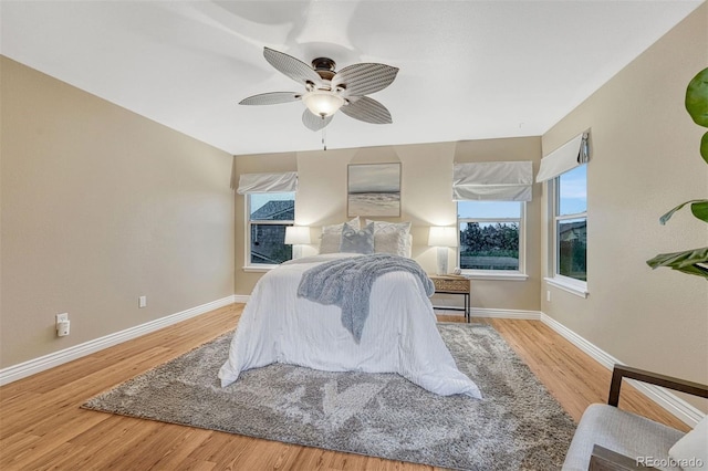 123 Wheat Ridge St, Palmer Lake, CO 80133 - bedroom with wood finished floors and a ceiling fan