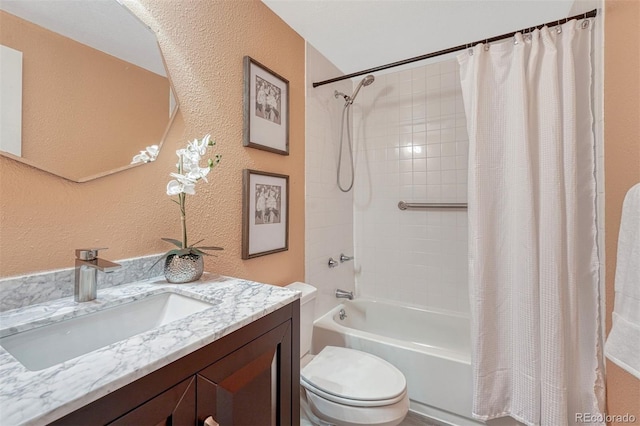 123 Wheat Ridge St, Palmer Lake, CO 80133 - full bath featuring vanity, a textured wall, and shower / bathtub combination with curtain