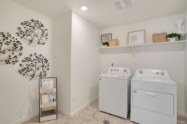 washroom featuring separate washer and dryer