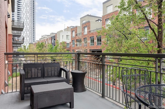 1440 Little Raven St Unit 202, Denver, CO 80202 - balcony with an outdoor hangout area and a residential view