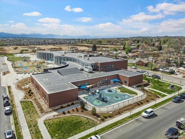 birds eye view of property featuring a mountain view