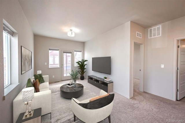 living room with light carpet