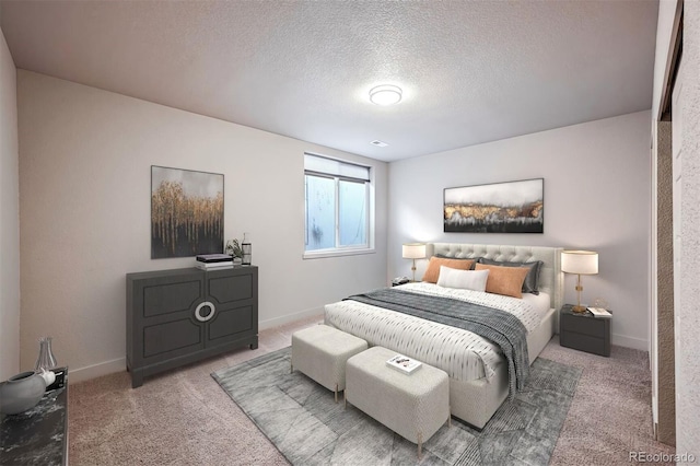 bedroom featuring carpet flooring and a textured ceiling