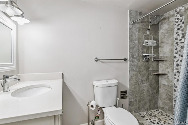 595 S Alton Way Unit 7B, Denver, CO 80247 - full bathroom featuring vanity and a tile shower