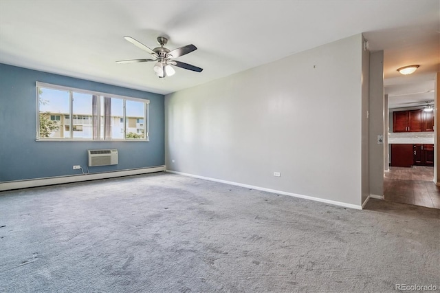 595 S Alton Way Unit 7B, Denver, CO 80247 - empty room featuring a ceiling fan, a baseboard radiator, carpet floors, and an AC wall unit