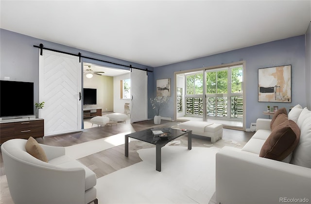 595 S Alton Way Unit 7B, Denver, CO 80247 - living area with a barn door