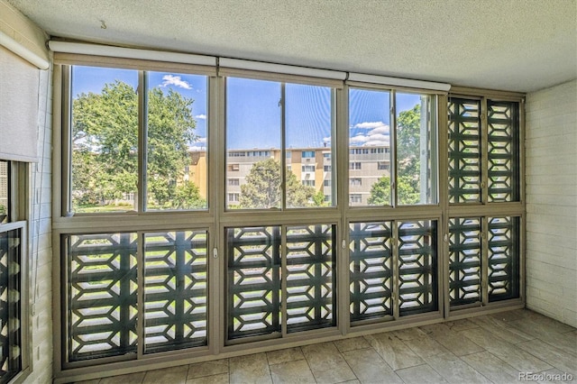 595 S Alton Way Unit 7B, Denver, CO 80247 - unfurnished sunroom featuring plenty of natural light