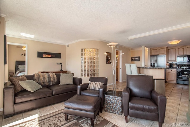 living room with ornamental molding, a textured ceiling, light tile patterned floors, and ceiling fan