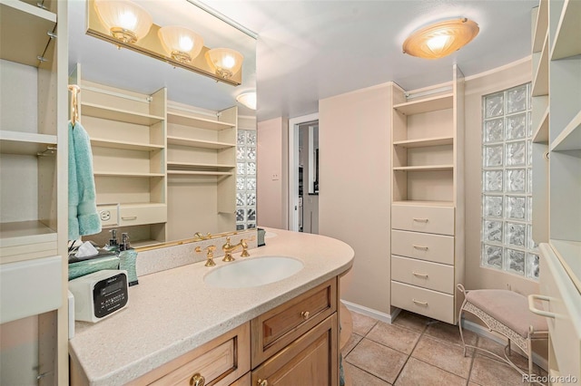 bathroom with vanity and tile patterned flooring