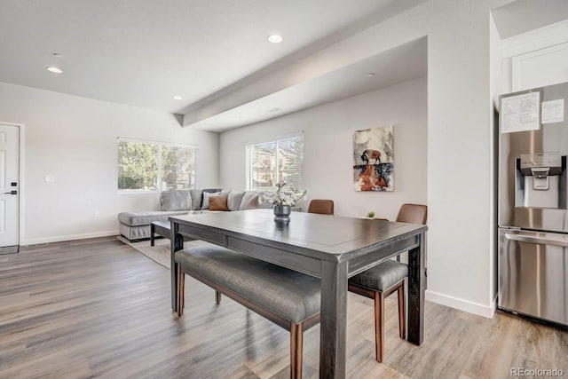 dining room with light hardwood / wood-style flooring