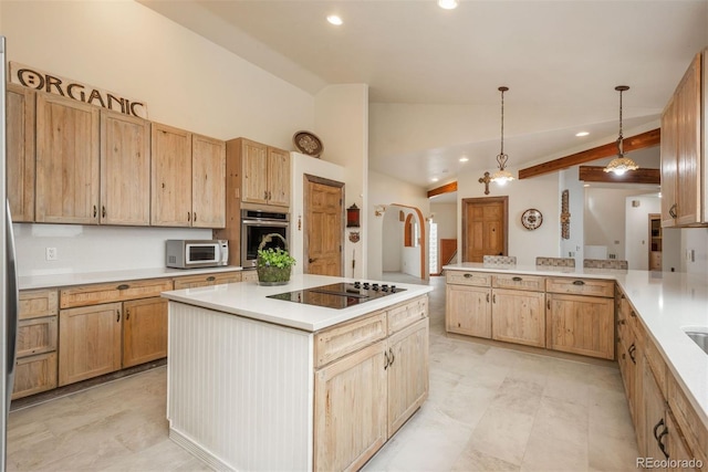kitchen featuring a peninsula, oven, white microwave, black electric stovetop, and recessed lighting